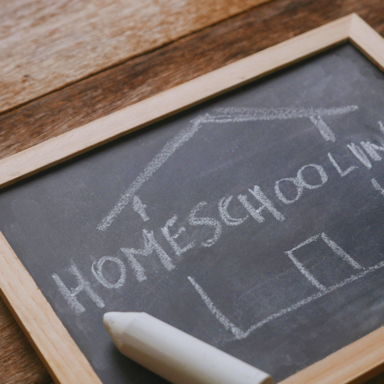 A chalkboard with a homeschool drawing